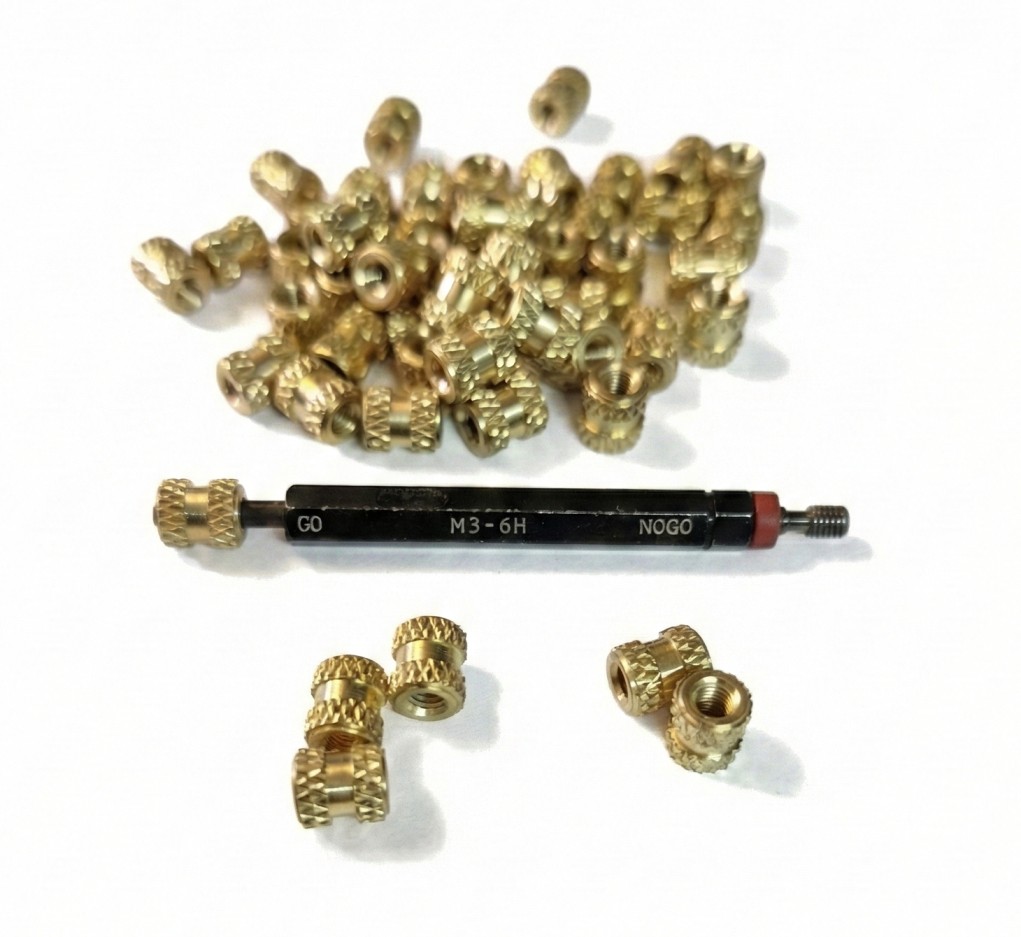 brass inserts with go not go gauge