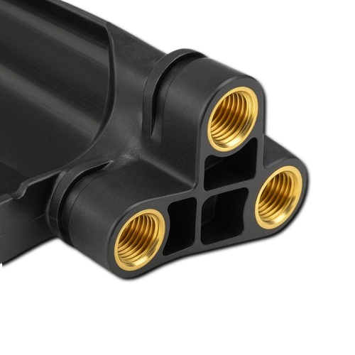 Brass threaded inserts embedded in a black molded plastic component with clean internal threads
